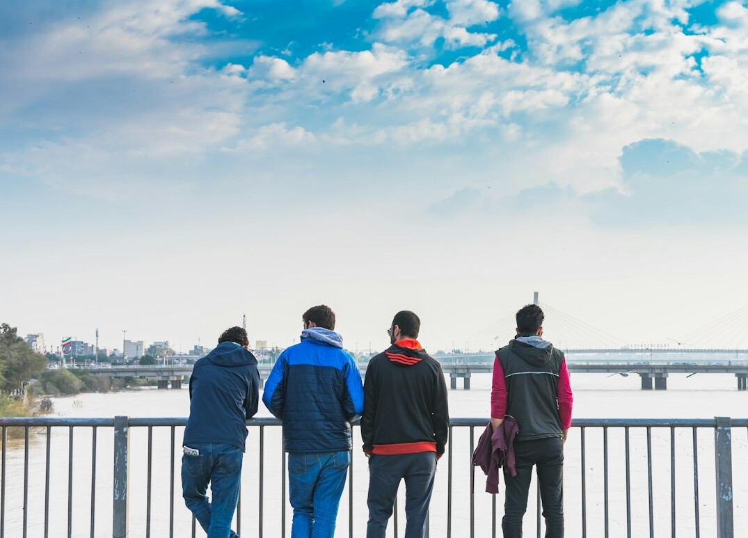 Four coordinators of a business network standing together